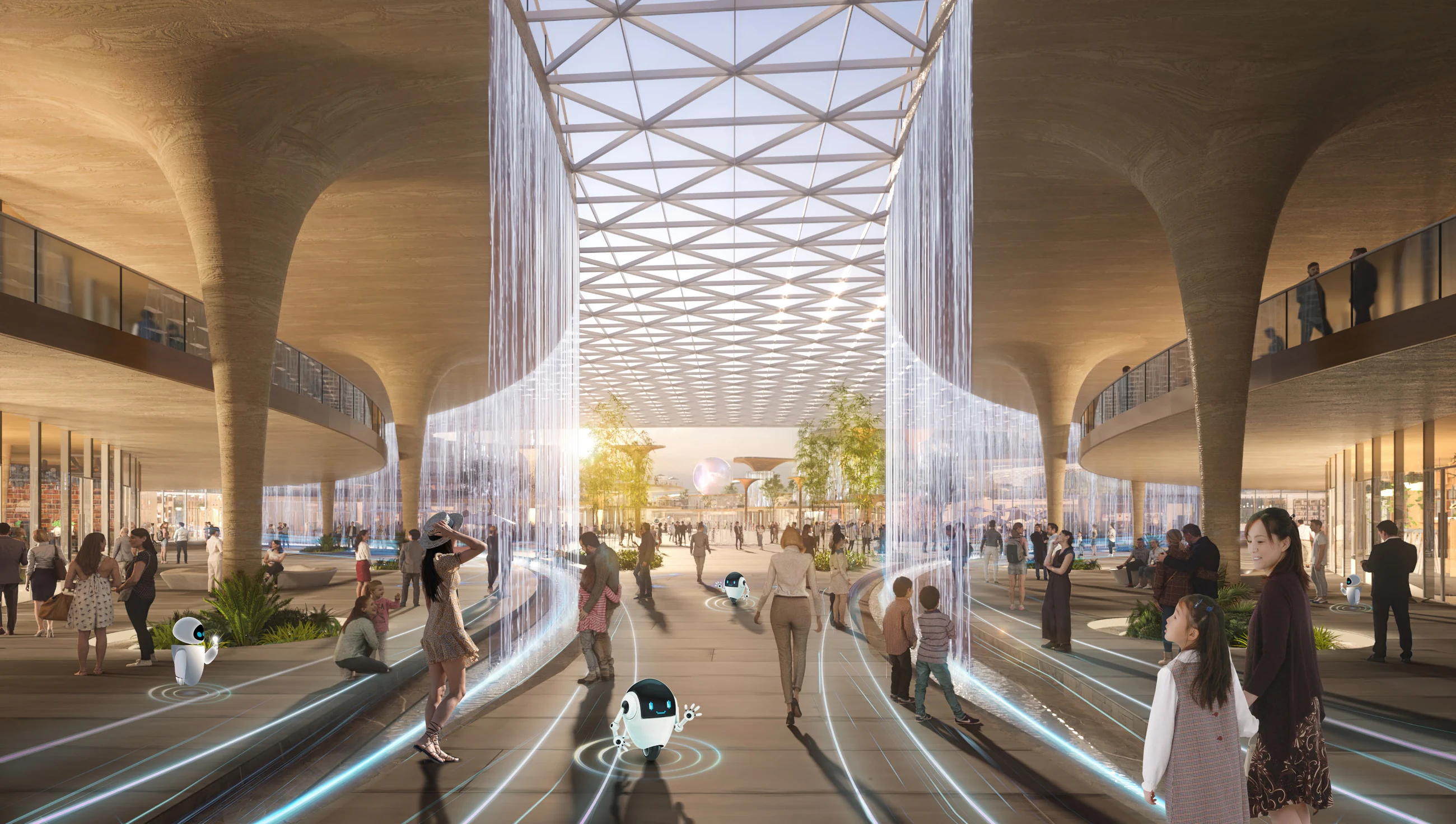 Interior view of the station concourse with a tall water installation
