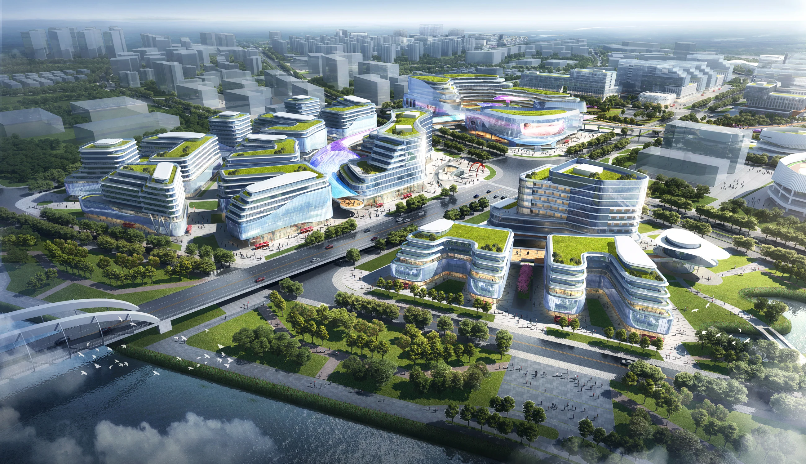 Aerial view of a mixed-use innovation cluster with green roofs and public plazas